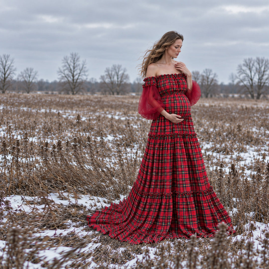 Red plaid maternity gown for a Christmas maternity photoshoot