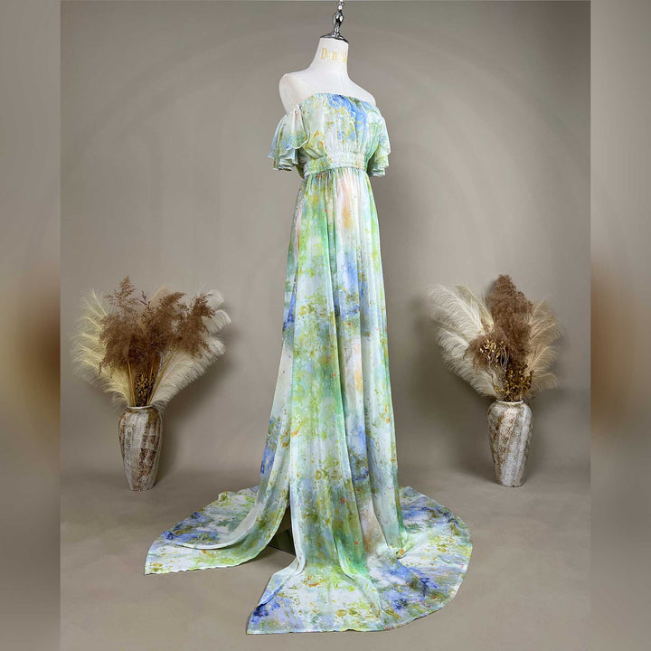 A mannequin wearing an Aglaea tie dye chiffon printed long dress stands in the center. 