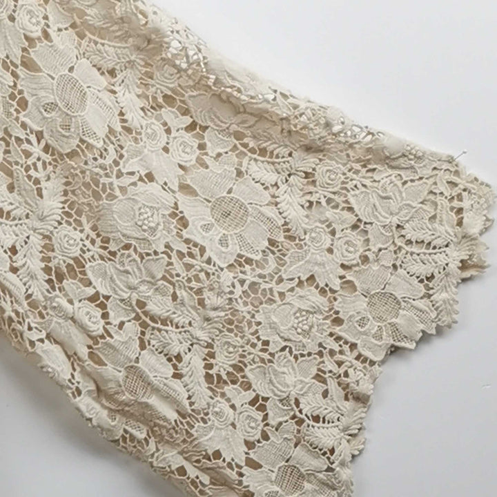This is Bendis-ivory-lace-off-shoulder-two-piece.