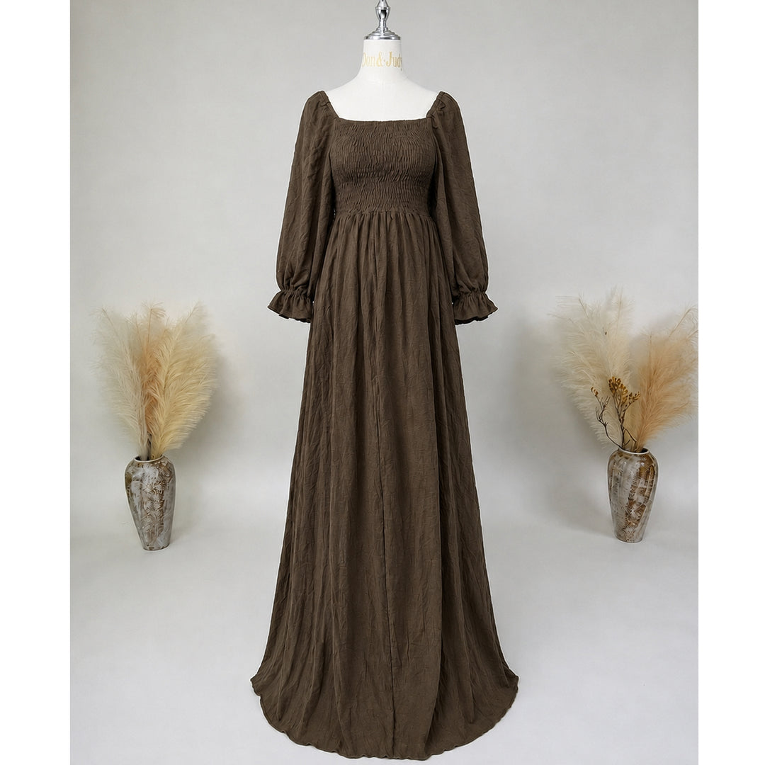 A khaki square-neck puff-sleeve ruched gown is displayed on a mannequin.
