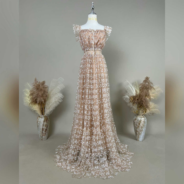 clete khaki floral embroidered short sleeve maternity photography dress displayed on a mannequin.