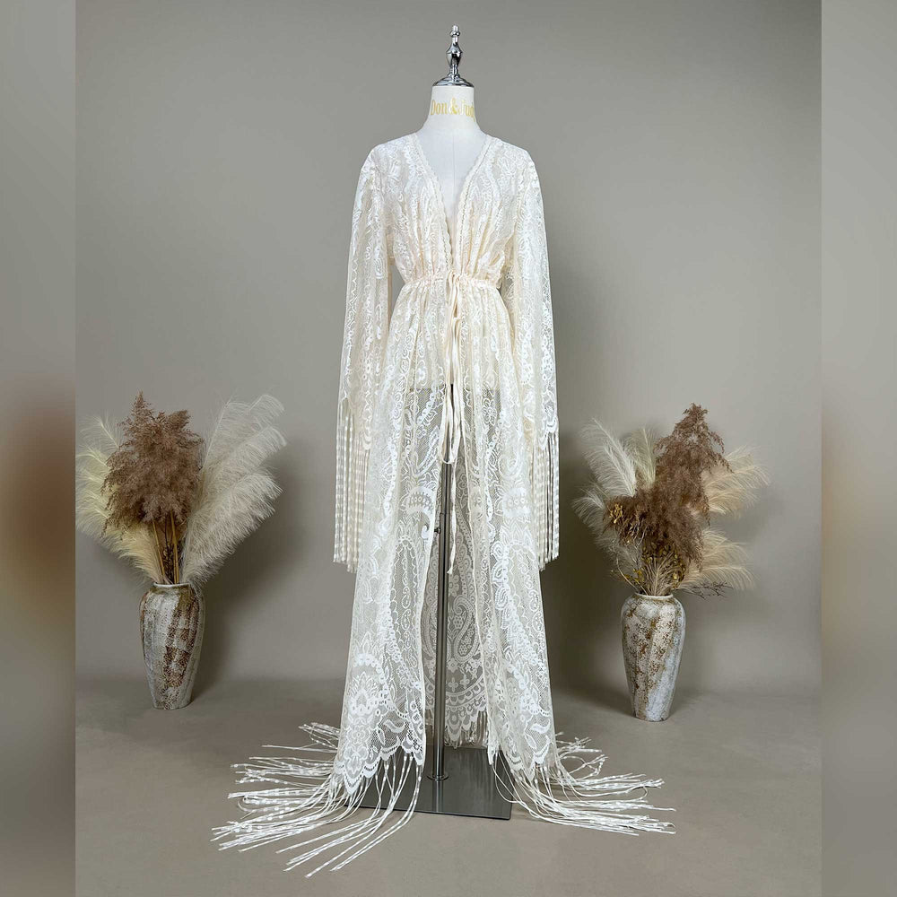 Fama beige lace fringe maternity photography dress displayed on a mannequin.