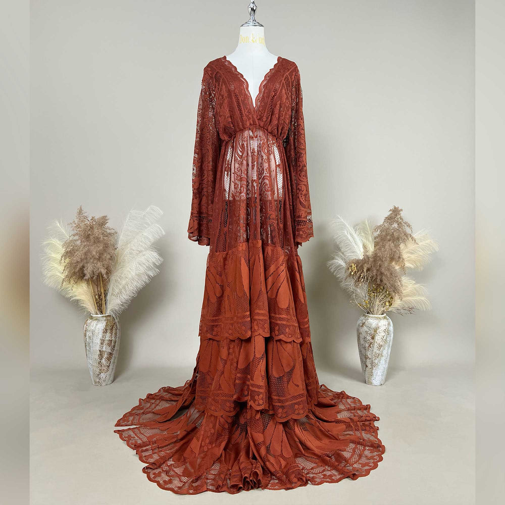 harpocrates terracotta tiered ruffle lace v neck maternity photography dress displayed on a mannequin.